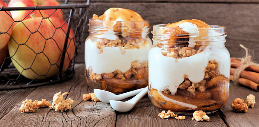 High-Protein Caramel Apple Parfait in glass jars