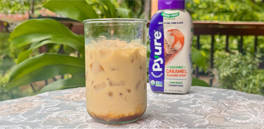 Glass of Caramel Golden Milk with Pyure Sugar-free Caramel Syrup