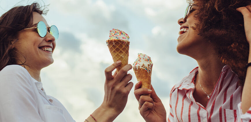 Two women laughing with sugar free ice cream