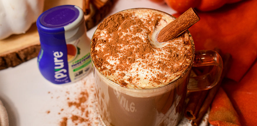 Low-Sugar Pumpkin Spice Latte in cup with cinnamon stick and Pyure sweetener