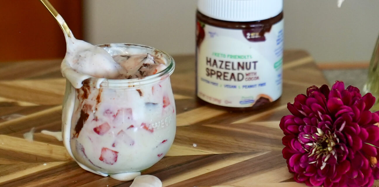 Cup of Protein Yogurt with Strawberries, Hazelnut Swirl & Chocolate Shell