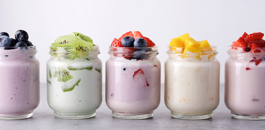 Various Yogurt Toppings including sugar-free and lower-sugar options in glass jars
