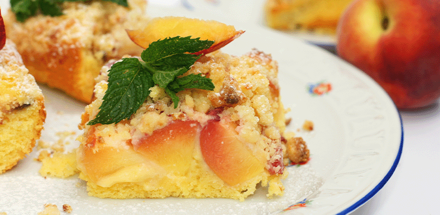 slice of peach cobbler cheesecake - pyure sugar free recipe